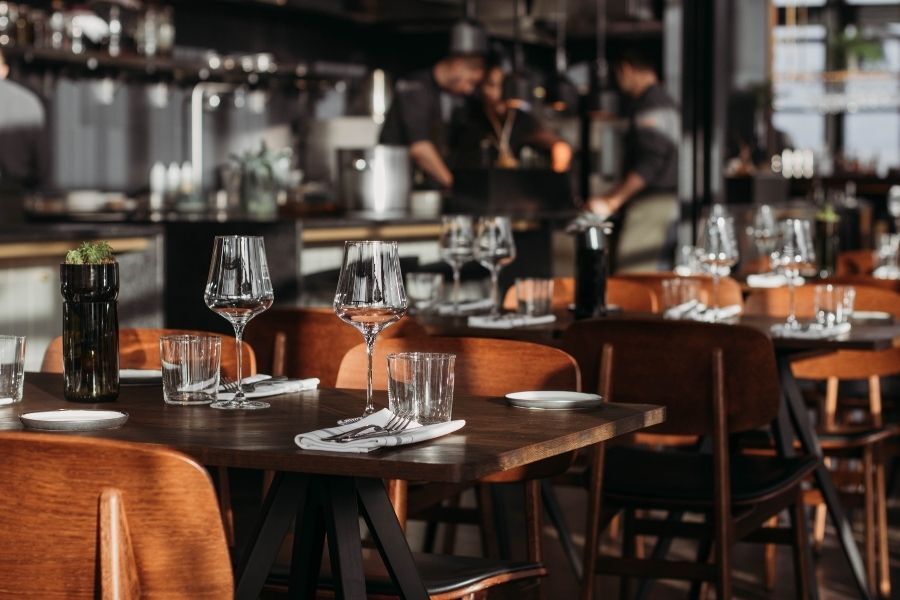 Restaurant check presented on a table in a Manhattan dining room
