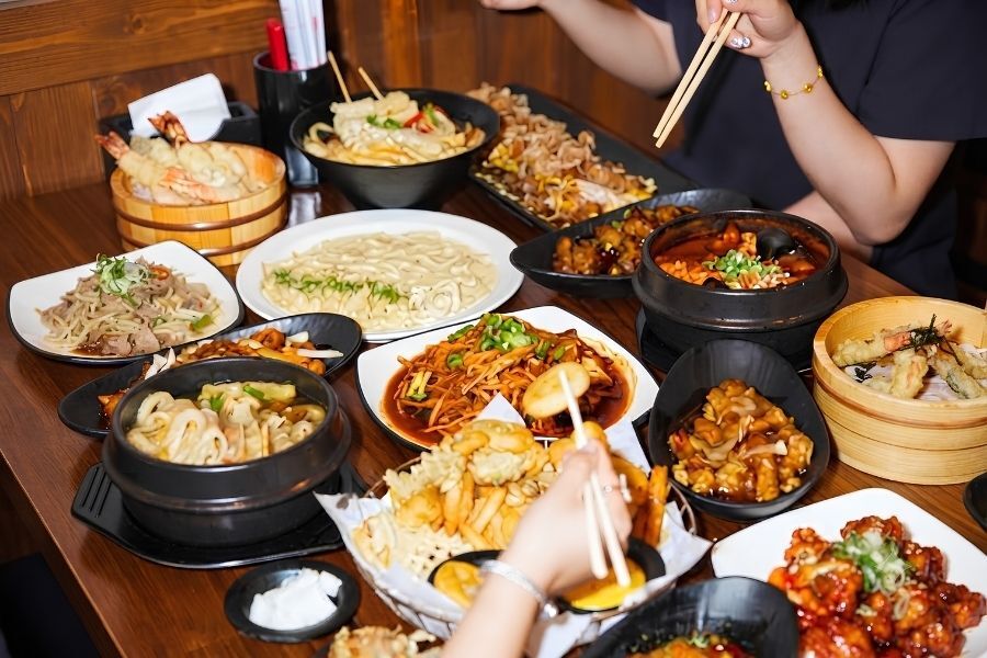 Korean food hall with open kitchen stations in Manhattan Koreatown