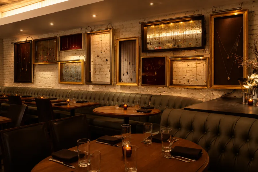Empty reserved table at a NYC restaurant during peak dinner service